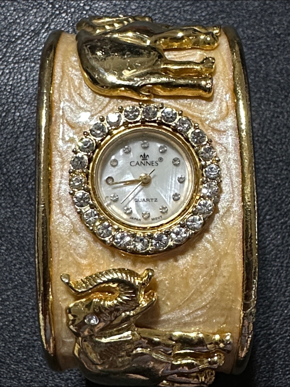 Cannes Gold Tone Elephant Hinged Enamel Clamper Bracelet Watch
